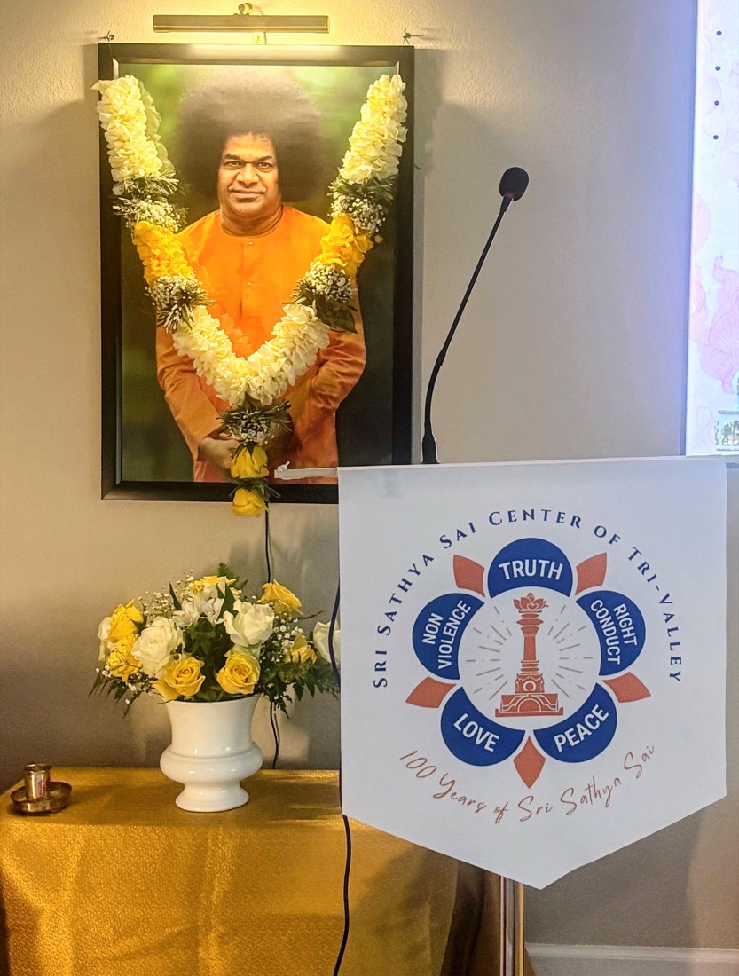 The center's altar: Sri Sathya Sai Baba's garlanded portrait beside the Sri Sathya Sai Center of Tri-Valley banner